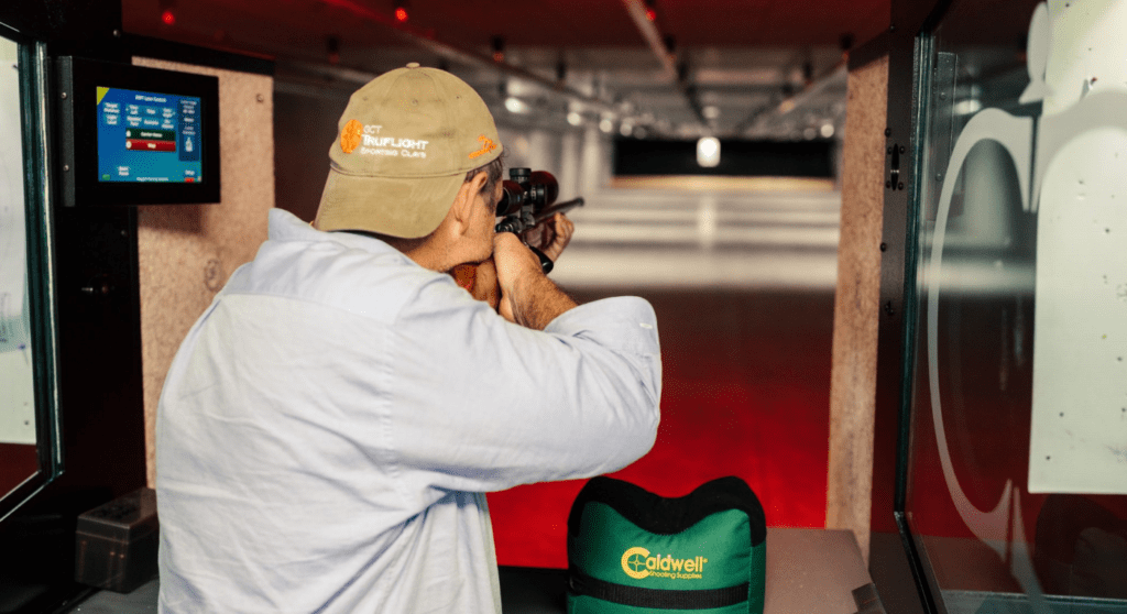 Man shooting a rifle at the Tamworth Regional Indoor Shooting Range